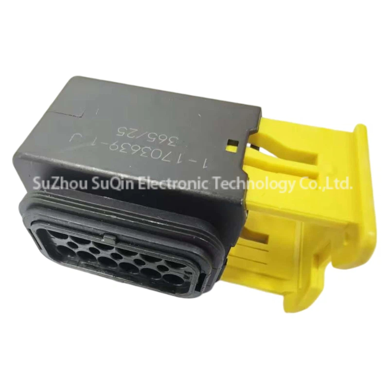 Close isometric angle view of 1-1703639-1 heavy duty female housing focusing on the printed part number markings on the black PBT GF30 shell and extended yellow slider arm.