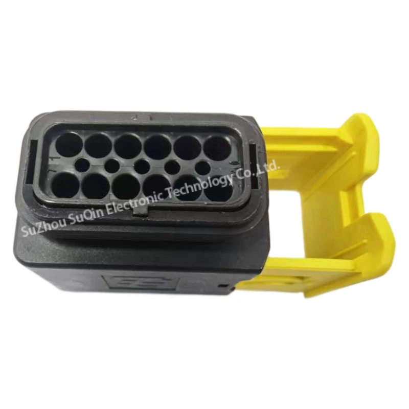 Front mating face view of the 1-1703639-1 female connector housing showcasing the dual-row 12-position socket cavity grid enclosed by a thick black rubber sealing gasket.