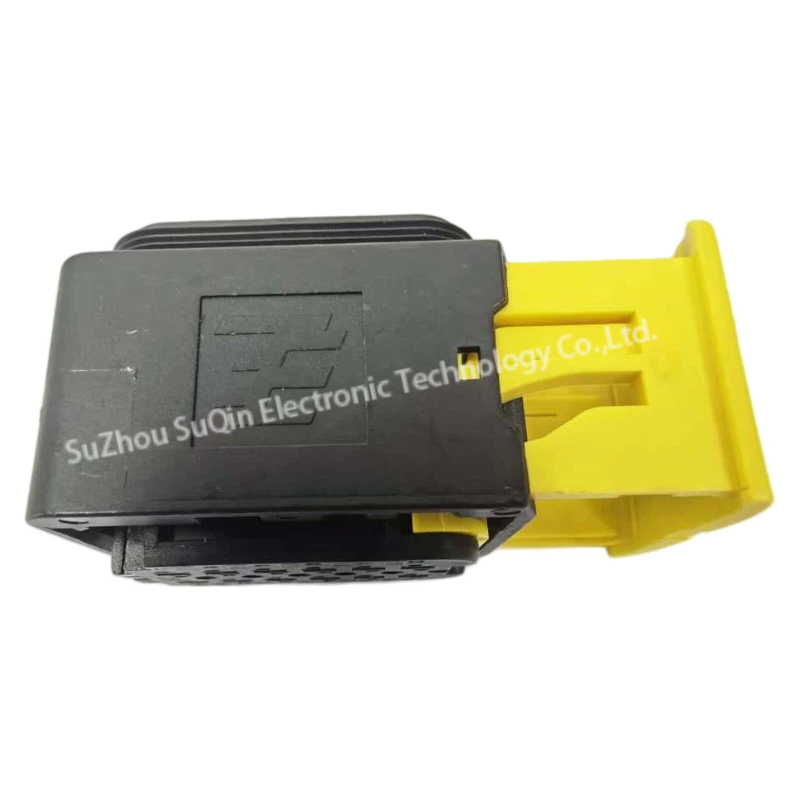 Side profile look of 1-1703639-1 rectangular automotive connector housing highlighting the robust outer shell locking tracks and the integrated yellow lever clip engagement point.
