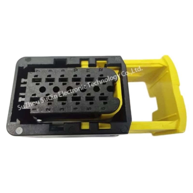 Rear perspective of TE Connectivity 1-1703639-1 automotive connector housing exposing the internal terminal alignment blocks and the hollow frame structure of the yellow slide lock.