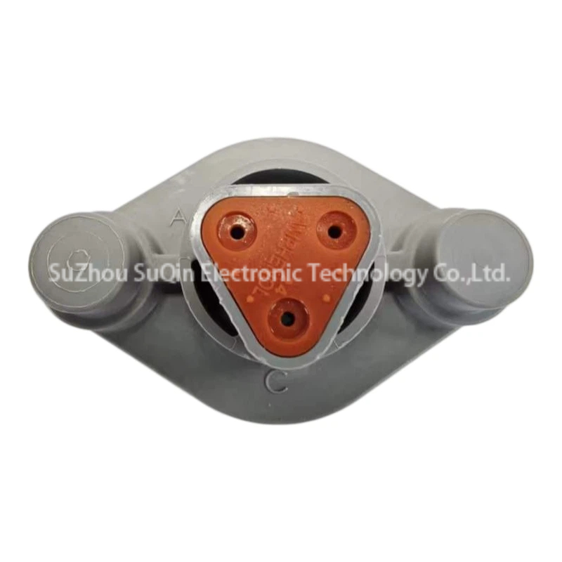 Direct rear face view of the AT04-3P-PM05 connector housing showing the triangular orange wire seal stamped with the Amphenol brand name and contact insertion ports.