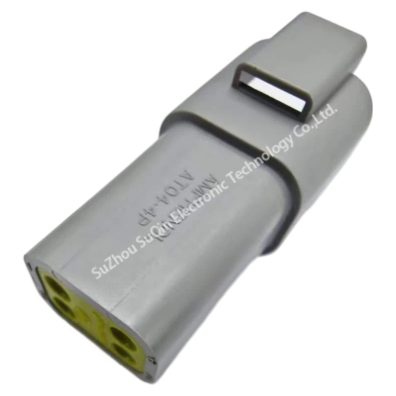 Isometric perspective view of the gray Amphenol AT04-4P 4-position rectangular receptacle housing showing clean thermoplastic finish.