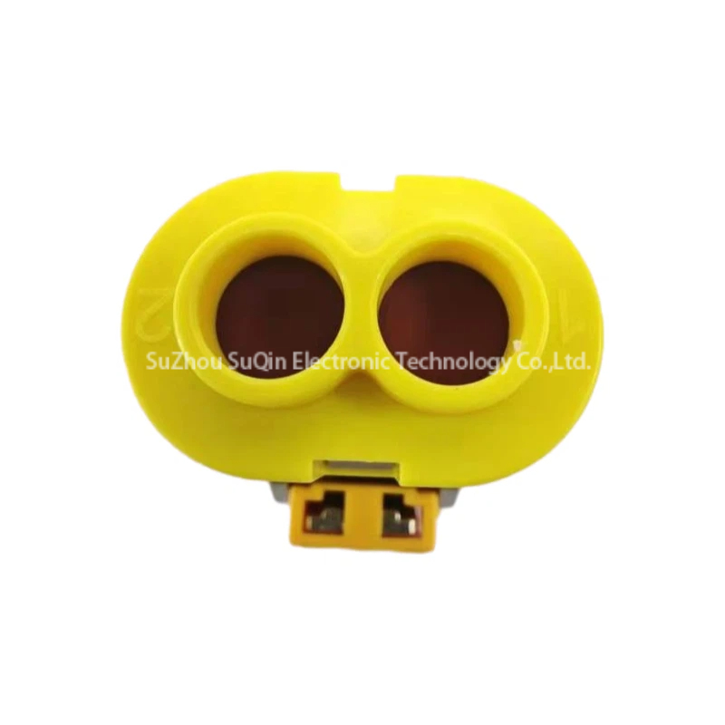 Rear end view of the PL182U-61 connector housing showing dual circular wire entry ports with internal red silicone sealing grommets.