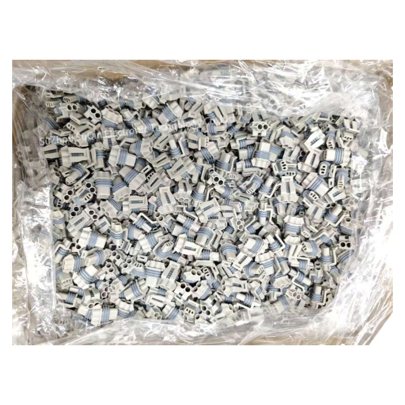 Industrial bulk packaging of Aptiv 12052644 2-pin connectors for wholesale.