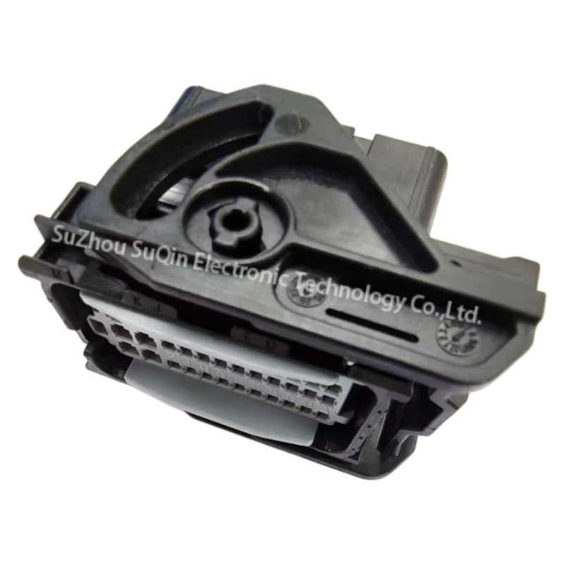 Angled top perspective view focusing on the robust black integrated cam-lever locking mechanical arm assembly of the 13956021 powertrain receptacle housing.
