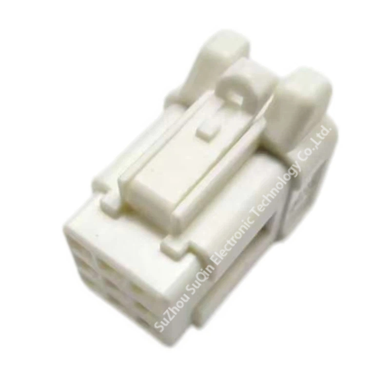 Top isometric view of a single white Hirose DF62W-9S-2.2C female connector housing focusing on the molded-in secure locking latch arm.