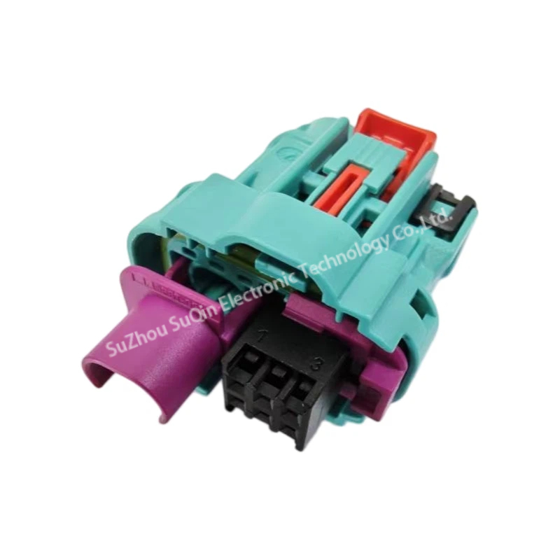 Isometric top-down perspective of E6Z089-000Z 6-way high-speed automotive connector housing emphasizing the integrated red mechanical connector position assurance slider.