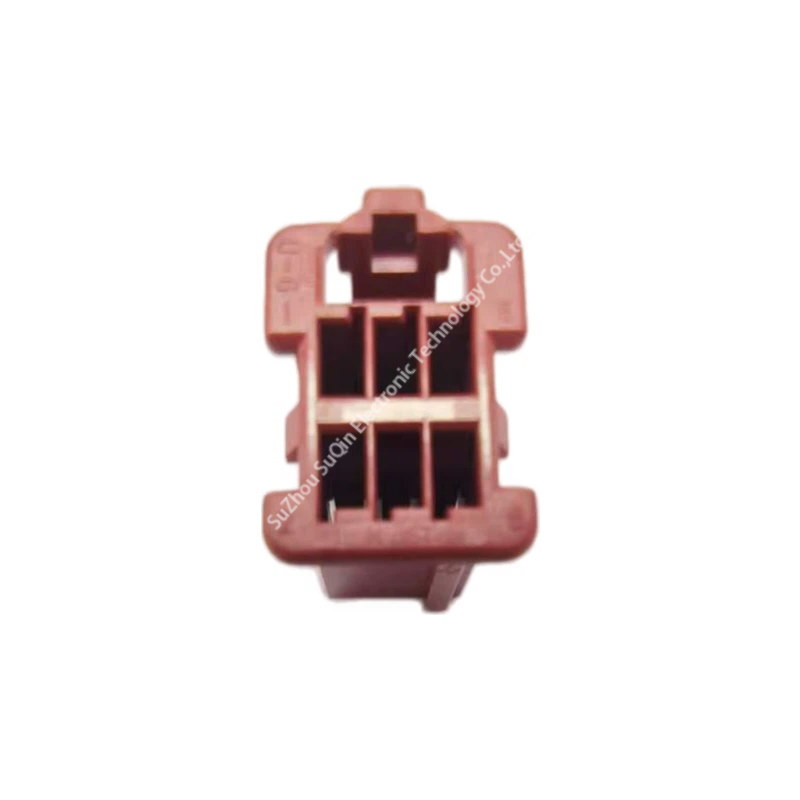 Rear view of a single JST ZNDP-06V-C-R red 6 pin plug housing showing wire insertion slots.