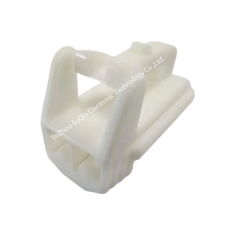 Isometric view of a single KET MG651026 2-pin connector housing highlighting the external locking clip and housing lance architecture.
