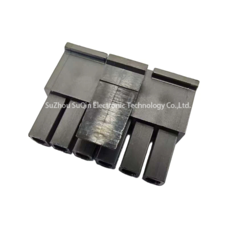 Bottom side view of the black rectangular shell of the 0436450600 6-pin connector housing showing the smooth plastic surface and locking tab assembly.