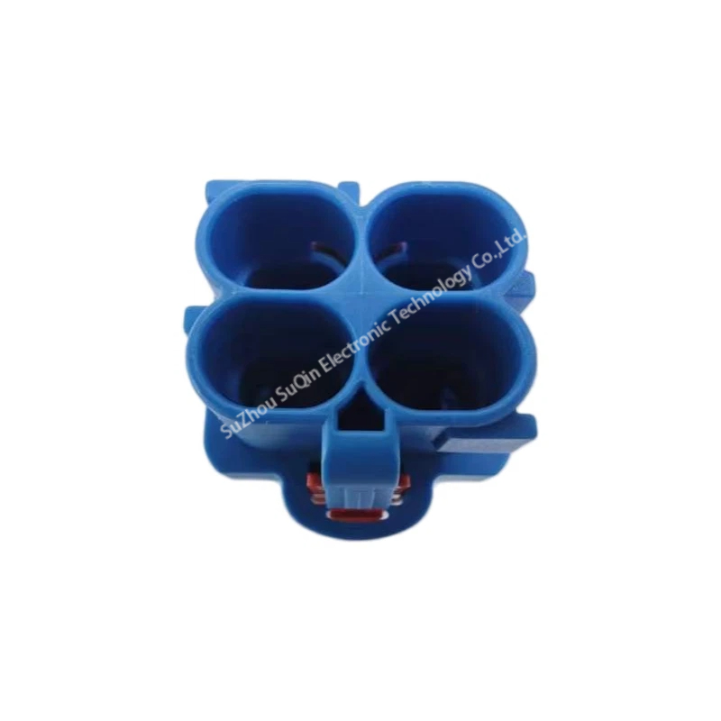 Direct front mating face view detailing the 4 circular quad-port cavity entries of the light blue Rosenberger H-MTD automotive housing.