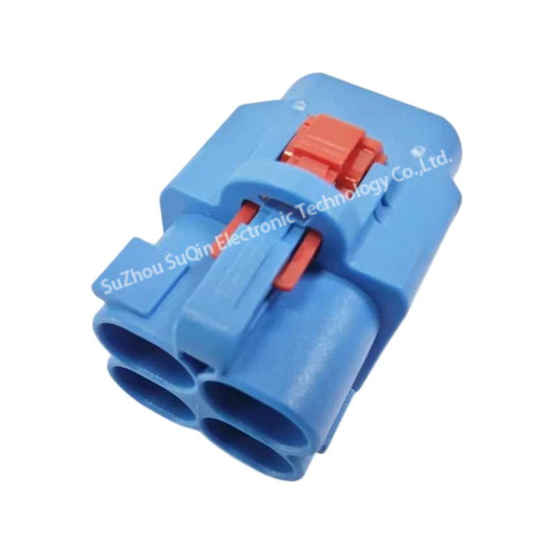 Isometric top-front view of a single light blue E6Z027-001-C H-MTD plastic housing focusing on the top-mounted red CPA clip and primary locking latch.