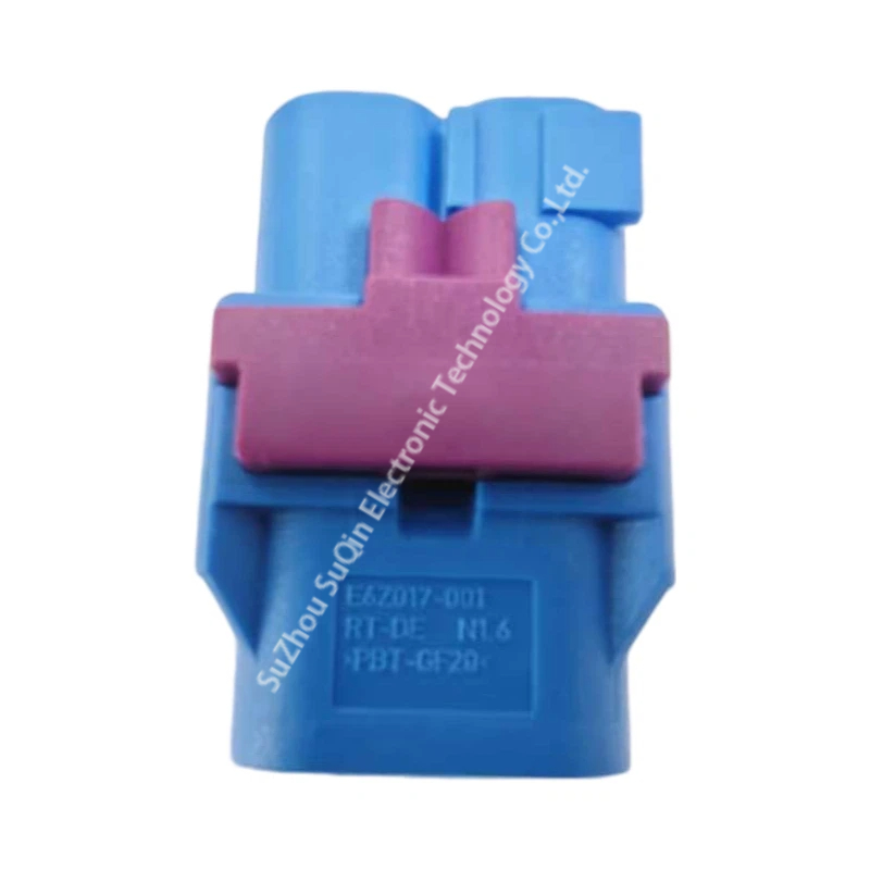 Flat back-face view of the E6Z027-001-C connector body showing clear molded part numbers, PBT-GF20 material stamping, and the purple lock bar.