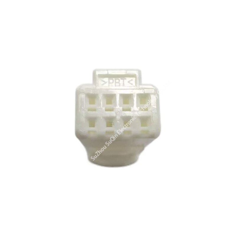 Rear wire insertion face view of the natural TE 1379659-5 automotive connector highlighting its PBT material stamp.