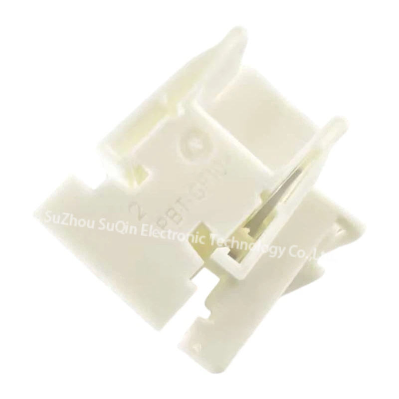 Close-up view of the TE 2-2141047-5 automotive housing shell showing the engraved PBT-GF10 material marking text.