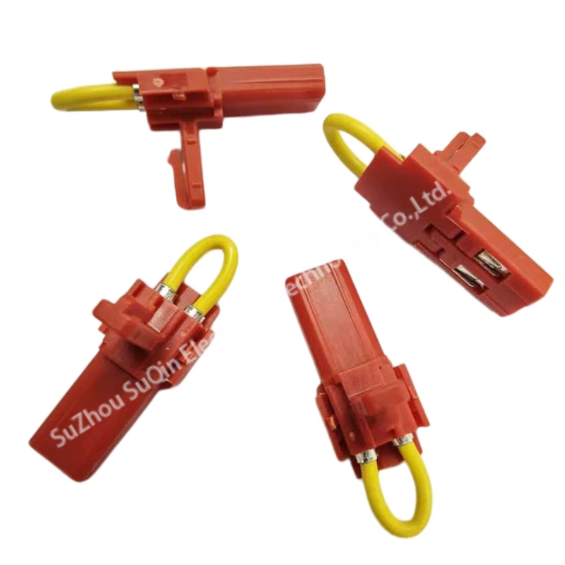 Four red TE Connectivity 2392567-1 TPA accessories shown with yellow test loop wires from multiple orthogonal views.