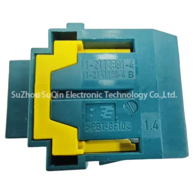 Detailed macro view of the connector side wall displaying molded TE connectivity brand logo, part number 1-2112891-4, sub-assembly code 1-2141168-4 B, and PBT-GF10 material specification.
