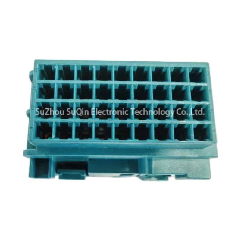 Perpendicular rear view of the 1-2112891-4 wire insertion face, showing the 36-position grid organized into 4 horizontal rows labeled with row numbers.