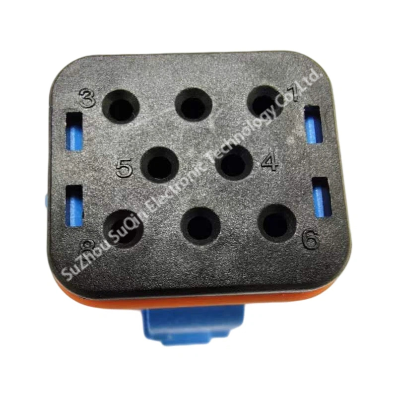 Rear look at the TSL-FPD08SL 8-circuit plug assembly focusing on the black core layout surrounded by the protective orange silicon rubber wire seal gasket.