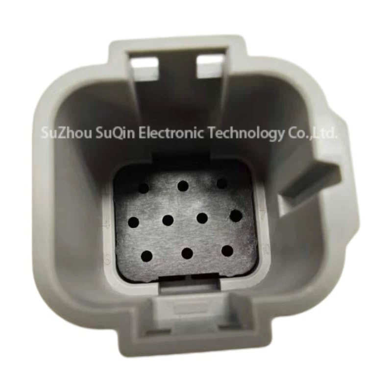 Internal view inside the TSL-FRD10PG gray receptacle shell focusing on the pre-installed protective PBT allocation block grid.